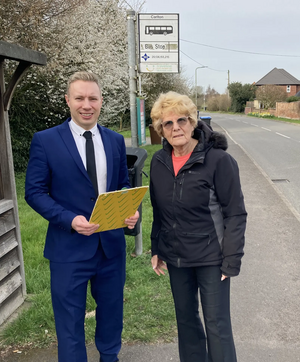 Michael Mullaney and Joyce Crooks campaigning to save local bus services