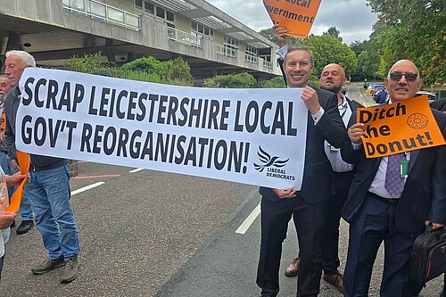 Cllr Mullaney protesting outside of county hall